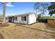 Single-story home featuring landscaping and a fenced-in backyard at 14120 Rutgers Ave, Orlando, FL 32826