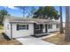 Charming single-story home with stone accents, fresh exterior paint, and updated landscaping at 14120 Rutgers Ave, Orlando, FL 32826