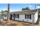 A well-maintained house featuring manicured landscaping and charming exterior details at 14120 Rutgers Ave, Orlando, FL 32826