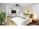 Stylish bedroom featuring wood-look floors and bright decor at 14120 Rutgers Ave, Orlando, FL 32826