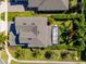 Aerial view of the house highlighting backyard with playset and screened-in pool at 14518 Black Quill Dr, Winter Garden, FL 34787