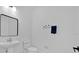 Modern half bathroom with a pedestal sink and toilet at 14518 Black Quill Dr, Winter Garden, FL 34787
