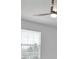 Bedroom with a ceiling fan, large window, and neutral paint at 14518 Black Quill Dr, Winter Garden, FL 34787