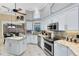 Modern kitchen with stainless steel appliances, granite countertops, and an open layout perfect for entertaining at 1525 Eagle Nest Cir, Winter Springs, FL 32708