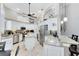 Bright kitchen with stainless steel appliances, granite countertops, ample storage space, and modern fixtures at 1525 Eagle Nest Cir, Winter Springs, FL 32708