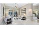 Inviting living room with neutral tones, stylish furnishings, and a seamless transition to the outdoor entertainment area at 1525 Eagle Nest Cir, Winter Springs, FL 32708