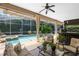 Beautiful screened-in pool and spa area is perfect for outdoor entertaining at 1525 Eagle Nest Cir, Winter Springs, FL 32708