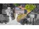 Aerial view of a home showcasing the roof, driveway, and surrounding landscaping and neighborhood at 1620 Carolyn Ct, St Cloud, FL 34769