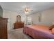 Comfortable bedroom with carpet, dresser, and a bright window offering natural light at 1620 Carolyn Ct, St Cloud, FL 34769