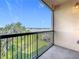 Balcony offering scenic views of lush greenery, a lake and beyond the neighborhood at 16300 County Road 455 # 405, Montverde, FL 34756