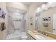 Bathroom featuring a shower-tub combo and ample counter space at 2086 Biller Cir, The Villages, FL 32163