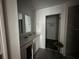 This bathroom features a double vanity and a walk-in closet at 264 Hayley St, Winter Haven, FL 33884