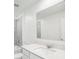 Bathroom vanity featuring a white countertop and a large mirror at 264 Hayley St, Winter Haven, FL 33884