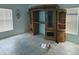 This bedroom features tile flooring and a window with blinds at 264 Hayley St, Winter Haven, FL 33884