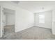 Bright and spacious bedroom with neutral carpet and natural light at 264 Hayley St, Winter Haven, FL 33884
