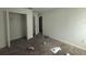 This bedroom has a closet, neutral carpet, and white trim at 264 Hayley St, Winter Haven, FL 33884
