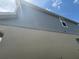 Two-toned exterior of home showcasing horizontal siding and textured stucco at 264 Hayley St, Winter Haven, FL 33884