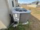 Efficient HVAC unit, ensuring year-round comfort in this home with a spacious backyard at 264 Hayley St, Winter Haven, FL 33884