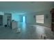 Spacious kitchen area with an island and white cabinets at 264 Hayley St, Winter Haven, FL 33884