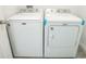 Maytag washer and dryer in a laundry room setup, ready for use at 264 Hayley St, Winter Haven, FL 33884