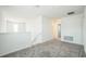 Spacious carpeted loft with natural light and access to bedrooms at 264 Hayley St, Winter Haven, FL 33884