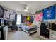 Bedroom with decor, plush bedding, ceiling fan, and natural light from the window at 304 Southern Pecan Cir # 105, Winter Garden, FL 34787