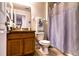 Cozy bathroom featuring vanity with granite countertop and shower with curtain at 30546 Lipizzan Ter, Mount Dora, FL 32757