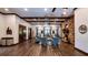 Clubhouse interior with ample seating, fireplace and beautiful floors at 30546 Lipizzan Ter, Mount Dora, FL 32757