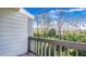 Relax on the balcony and take in views of the surrounding trees and blue sky at 316 Scottsdale Sq # 316, Winter Park, FL 32792