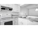 Bright kitchen featuring modern appliances and countertops that provide ample workspace at 316 Scottsdale Sq # 316, Winter Park, FL 32792