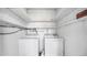 Laundry room area with side by side washer and dryer hookups at 316 Scottsdale Sq # 316, Winter Park, FL 32792