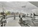 Spacious fitness center with modern cardio machines and large windows at 322 E Central Blvd # 1909, Orlando, FL 32801