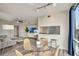 Modern living room features an open layout, sleek furnishings, and floor-to-ceiling windows offering great city views at 322 E Central Blvd # 1909, Orlando, FL 32801