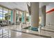 Bright and open lobby with stylish decor, comfortable seating, and large windows at 322 E Central Blvd # 1909, Orlando, FL 32801