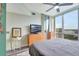Comfortable main bedroom with natural light, modern decor, and neutral color scheme at 322 E Central Blvd # 1909, Orlando, FL 32801