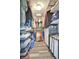 Walk-in closet with organized shelving, providing ample storage and functionality at 322 E Central Blvd # 1909, Orlando, FL 32801