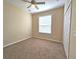 Bedroom with carpet, window, and closet at 3506 Creswick Cir, Orlando, FL 32829