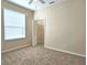 Bedroom with carpet, closet, and window at 3506 Creswick Cir, Orlando, FL 32829