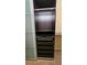 Organized closet with shelving, drawers, and hanging rod at 3506 Creswick Cir, Orlando, FL 32829
