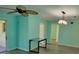 Open living room showing connection to additional room in the home at 3586 Eversholt St, Clermont, FL 34711