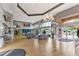 Spacious lobby with high ceilings, elegant chandelier, seating areas and large windows at 3586 Eversholt St, Clermont, FL 34711