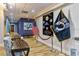 Welcoming lobby area with comfortable seating, decorative flags, and artwork, creating an inviting atmosphere at 3586 Eversholt St, Clermont, FL 34711
