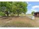 Large, fenced backyard featuring large trees, and plenty of space at 43825 State Road 19, Altoona, FL 32702