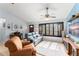 Inviting living room featuring natural light, comfortable seating, and an open layout at 43825 State Road 19, Altoona, FL 32702
