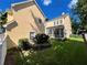 Well-maintained backyard with manicured lawn and screened porch for outdoor enjoyment at 508 Sycamore St, Celebration, FL 34747