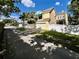 A bright yellow home with garage and fenced yard in a sunny, residential neighborhood at 508 Sycamore St, Celebration, FL 34747