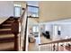 Grand foyer with a stairway leading to an upper level, showcasing an open layout to the living area at 508 Sycamore St, Celebration, FL 34747