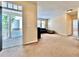 Spacious living area with carpet flooring, connected to a cozy outdoor porch at 508 Sycamore St, Celebration, FL 34747