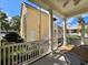 Spacious screened-in patio with white columns offering serene outdoor living at 508 Sycamore St, Celebration, FL 34747