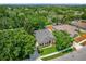 Charming single-story home with well-manicured lawn and mature landscaping at 530 Hiawatha Palm Pl, Apopka, FL 32712